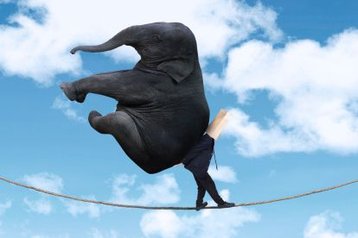 big data elephant cloud tightrope