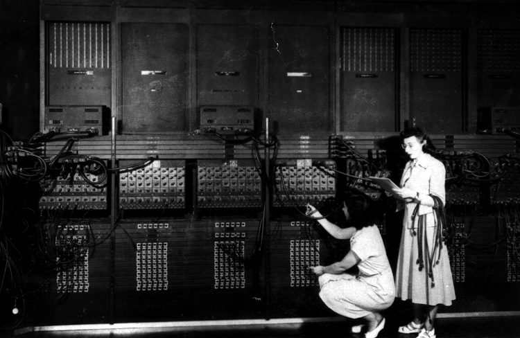 ENIAC being programmed, https://www.datacenterdynamics.com/en/analysis/eniac-at-75-a-pioneer-of-computing/
