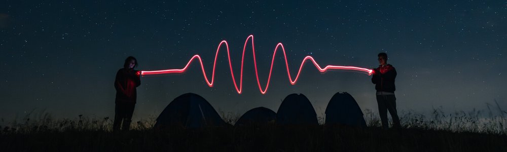 epa24---two-figures-create-a-light-trail-18042587587789e2c6c00ae7258c5a6ec2b840