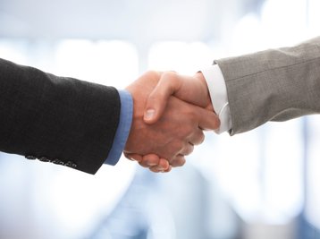 handshake merger acquisition deal thinkstock eszter szepessy