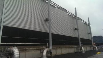 A typical larger evaporative cooling tower which will benefit from thermal testing to ensure optimum performance.