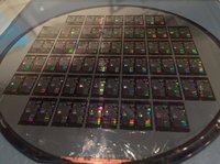 Quantum dot laser integrated onto photonic chiplet