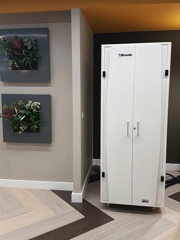 A micro data center can sit in an acoustic cabinet, in the corner of your office