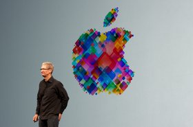 Tim Cook and the Apple logo