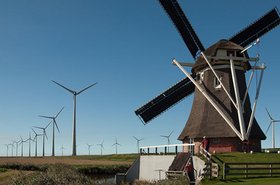Old versus new: a wind farm in Eemshaven
